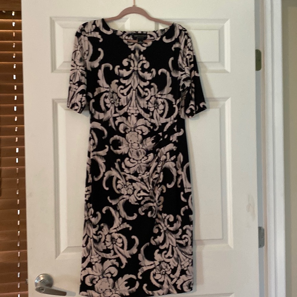 Beautiful Dress! Cinched on side flatters the waist